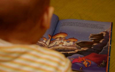 Reading in her own way :-)